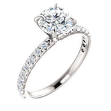 6.5mm Round Forever One™ Moissanite & 1/3 CTW Diamond Engagement Ring